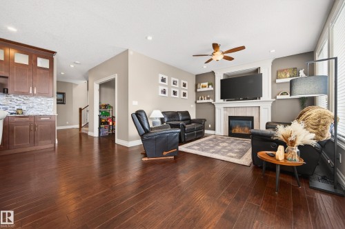 5204 Rue Eaglemont, Beaumont, AB - Indoor Photo Showing Living Room With Fireplace