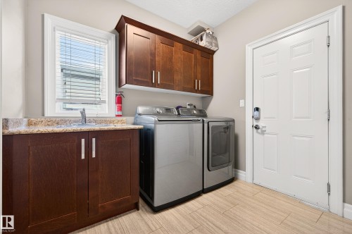 5204 Rue Eaglemont, Beaumont, AB - Indoor Photo Showing Laundry Room