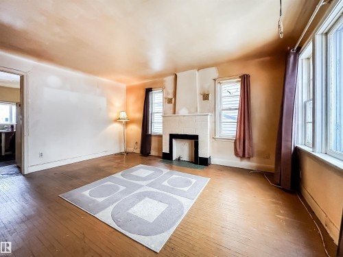 11345 93 Street, Edmonton, AB - Indoor Photo Showing Living Room With Fireplace