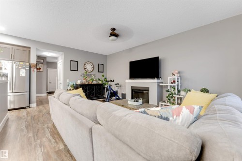 2987 Chokecherry Common, Edmonton, AB - Indoor Photo Showing Living Room With Fireplace