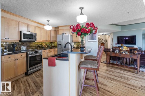 1103 9020 Jasper Avenue, Edmonton, AB - Indoor Photo Showing Kitchen With Stainless Steel Kitchen