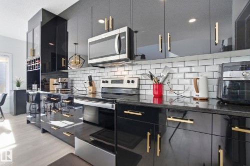 15851 22 Avenue, Edmonton, AB - Indoor Photo Showing Kitchen With Upgraded Kitchen