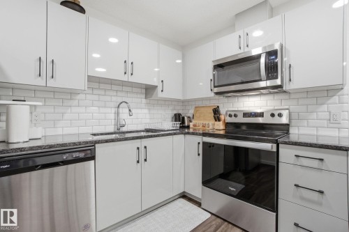 15851 22 Avenue, Edmonton, AB - Indoor Photo Showing Kitchen With Stainless Steel Kitchen With Upgraded Kitchen