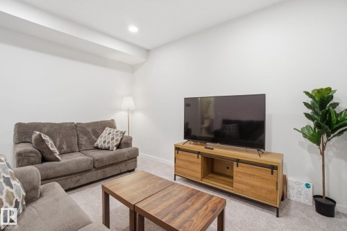 15851 22 Avenue, Edmonton, AB - Indoor Photo Showing Living Room