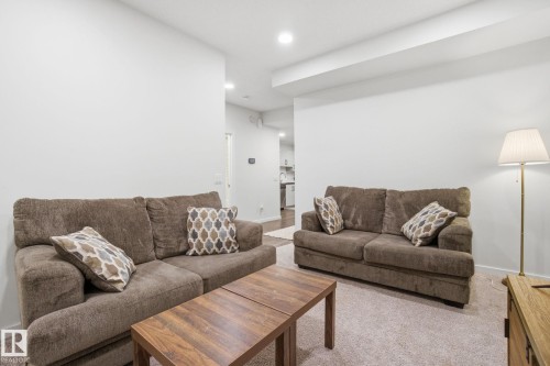 15851 22 Avenue, Edmonton, AB - Indoor Photo Showing Living Room