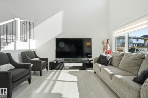 15851 22 Avenue, Edmonton, AB - Indoor Photo Showing Living Room