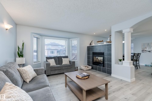 66 Bridgeport Wynd, Leduc, AB - Indoor Photo Showing Living Room With Fireplace