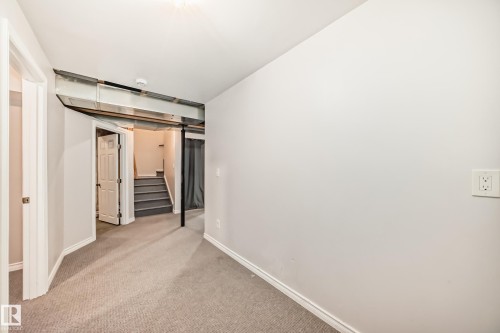 Room for a card table downstairs - 14 Spring Gate, Spruce Grove, AB - Indoor Photo Showing Other Room