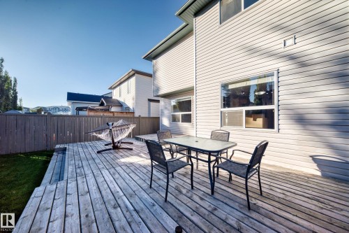 Wooden terrace with outdoor dining space - 14 Spring Gate, Spruce Grove, AB - Outdoor With Deck Patio Veranda With Exterior