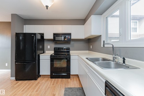 17020 100 Street, Edmonton, AB - Indoor Photo Showing Kitchen With Double Sink