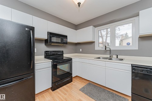 17020 100 Street, Edmonton, AB - Indoor Photo Showing Kitchen With Double Sink