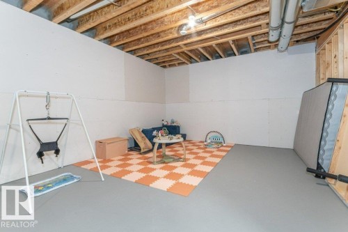 698 Howatt Drive Sw, Edmonton, AB - Indoor Photo Showing Basement