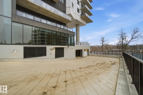 Exterior view of the property featuring a modern architectural design, expansive windows, and private balconies - 516 260 Bellerose Dr, St. Albert, AB - Outdoor With Balcony With Exterior