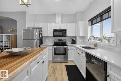 2 3010 33 Avenue, Edmonton, AB - Indoor Photo Showing Kitchen With Double Sink With Upgraded Kitchen