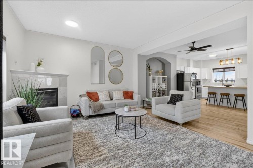 2 3010 33 Avenue, Edmonton, AB - Indoor Photo Showing Living Room With Fireplace