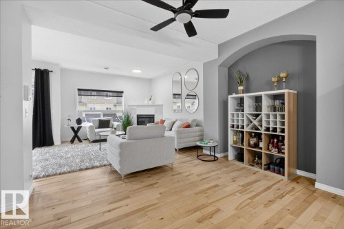 2 3010 33 Avenue, Edmonton, AB - Indoor Photo Showing Living Room With Fireplace