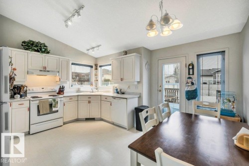 49 Mcleod Crescent, Leduc, AB - Indoor Photo Showing Kitchen With Double Sink