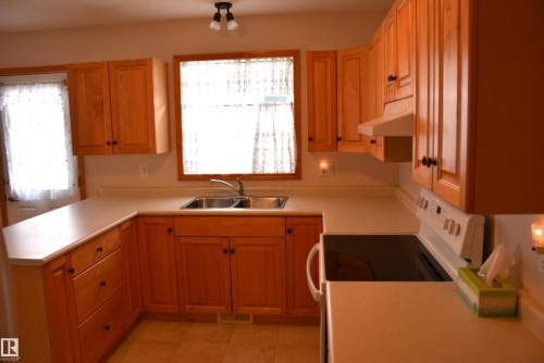 3 4806 51 Avenue, Barrhead, AB - Indoor Photo Showing Kitchen With Double Sink