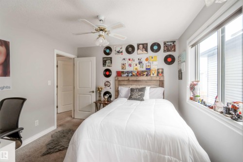 This room features a window providing natural light, a ceiling fan, and light gray walls - 12232 167B Avenue, Edmonton, AB - Indoor Photo Showing Bedroom