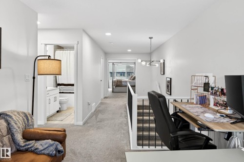 This property features neutral-toned walls, recessed lighting, and carpeting throughout - 6127 Carr Road, Edmonton, AB - Indoor