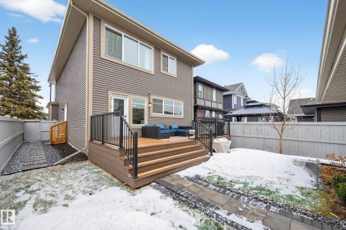 The property features a back deck with stairs, siding exterior, and a fenced yard - 6127 Carr Road, Edmonton, AB - Outdoor With Deck Patio Veranda With Exterior