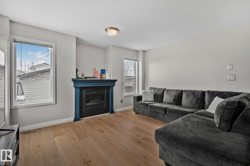 18 Virginia Loop, Spruce Grove, AB - Indoor Photo Showing Living Room With Fireplace
