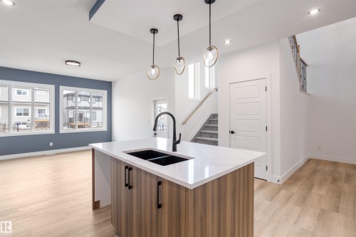 205 Basin Court, Leduc, AB - Indoor Photo Showing Kitchen With Double Sink With Upgraded Kitchen