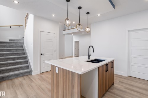 205 Basin Court, Leduc, AB - Indoor Photo Showing Kitchen With Double Sink With Upgraded Kitchen