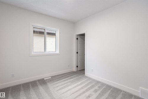 205 Basin Court, Leduc, AB - Indoor Photo Showing Other Room