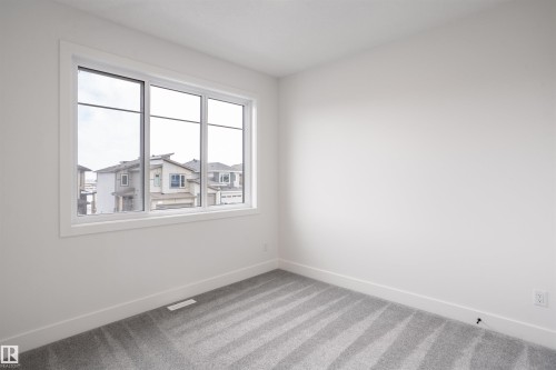 205 Basin Court, Leduc, AB - Indoor Photo Showing Other Room