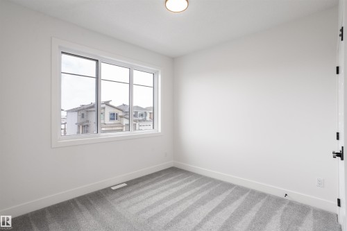 205 Basin Court, Leduc, AB - Indoor Photo Showing Other Room