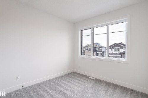 205 Basin Court, Leduc, AB - Indoor Photo Showing Other Room