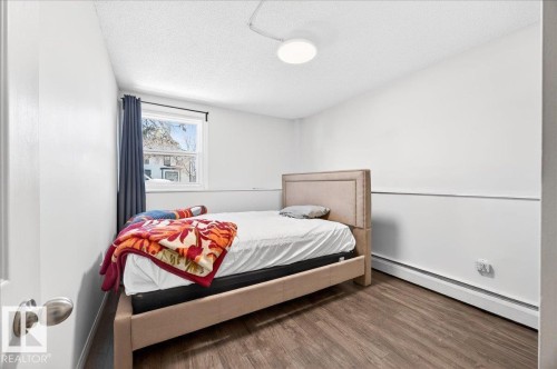 #101 2111 14 St Sw, Calgary, AB - Indoor Photo Showing Bedroom