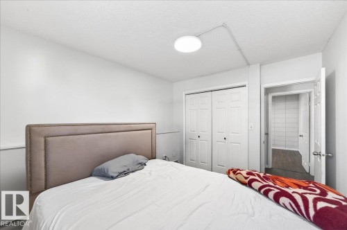 #101 2111 14 St Sw, Calgary, AB - Indoor Photo Showing Bedroom