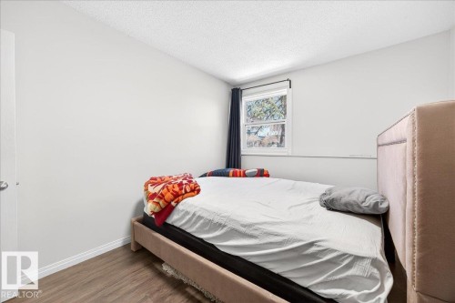 #101 2111 14 St Sw, Calgary, AB - Indoor Photo Showing Bedroom