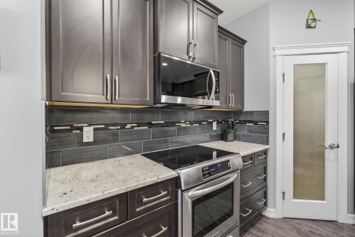 13 Garneau Gate, Spruce Grove, AB - Indoor Photo Showing Kitchen With Upgraded Kitchen