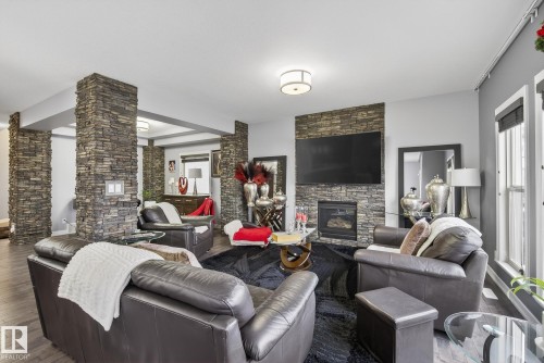 13 Garneau Gate, Spruce Grove, AB - Indoor Photo Showing Living Room With Fireplace