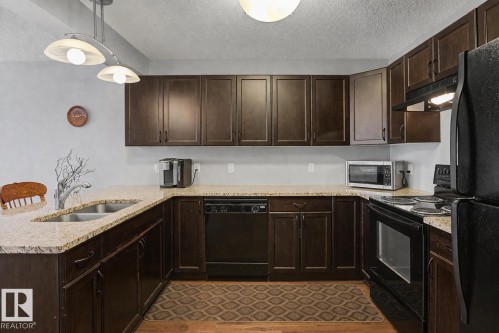 23 2005 70 Street, Edmonton, AB - Indoor Photo Showing Kitchen With Double Sink