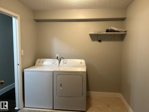 Edmonton, AB - Indoor Photo Showing Laundry Room
