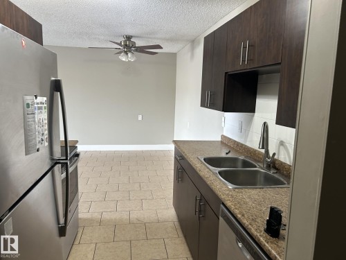 Edmonton, AB - Indoor Photo Showing Kitchen With Double Sink