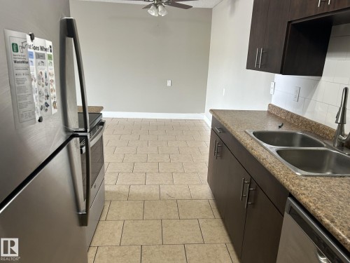 Edmonton, AB - Indoor Photo Showing Kitchen With Double Sink