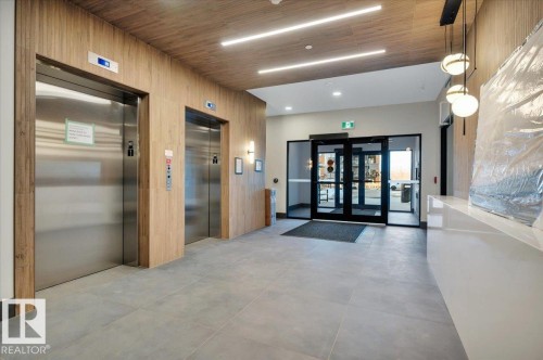 MAIN BULDING LOBBY - 322 7459 May Common Nw, Edmonton, AB - Indoor Photo Showing Other Room