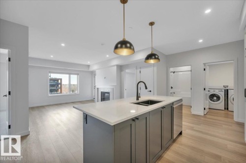 322 7459 May Common Nw, Edmonton, AB - Indoor Photo Showing Kitchen With Double Sink