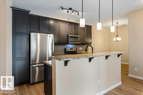206 6083 Maynard Way, Edmonton, AB - Indoor Photo Showing Kitchen With Stainless Steel Kitchen With Upgraded Kitchen