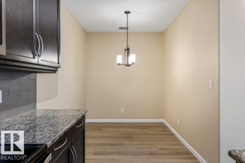 206 6083 Maynard Way, Edmonton, AB - Indoor Photo Showing Kitchen