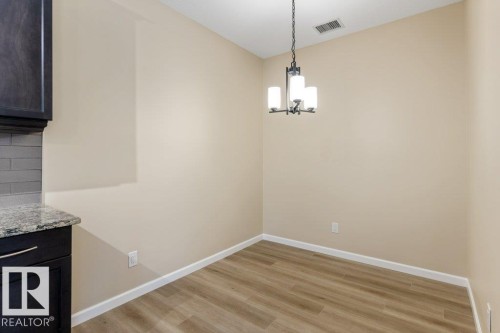 206 6083 Maynard Way, Edmonton, AB - Indoor Photo Showing Other Room