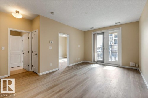 206 6083 Maynard Way, Edmonton, AB - Indoor Photo Showing Other Room