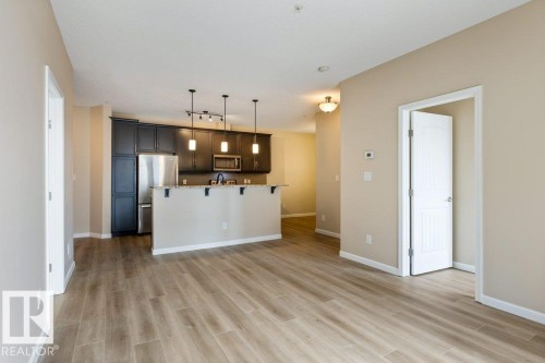 206 6083 Maynard Way, Edmonton, AB - Indoor Photo Showing Kitchen