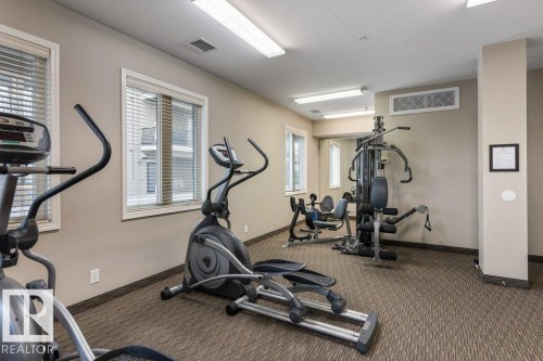 206 6083 Maynard Way, Edmonton, AB - Indoor Photo Showing Gym Room