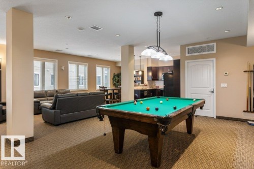 206 6083 Maynard Way, Edmonton, AB - Indoor Photo Showing Other Room